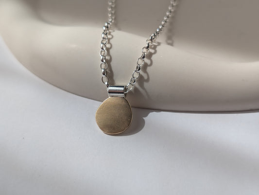 Gold pebble necklace