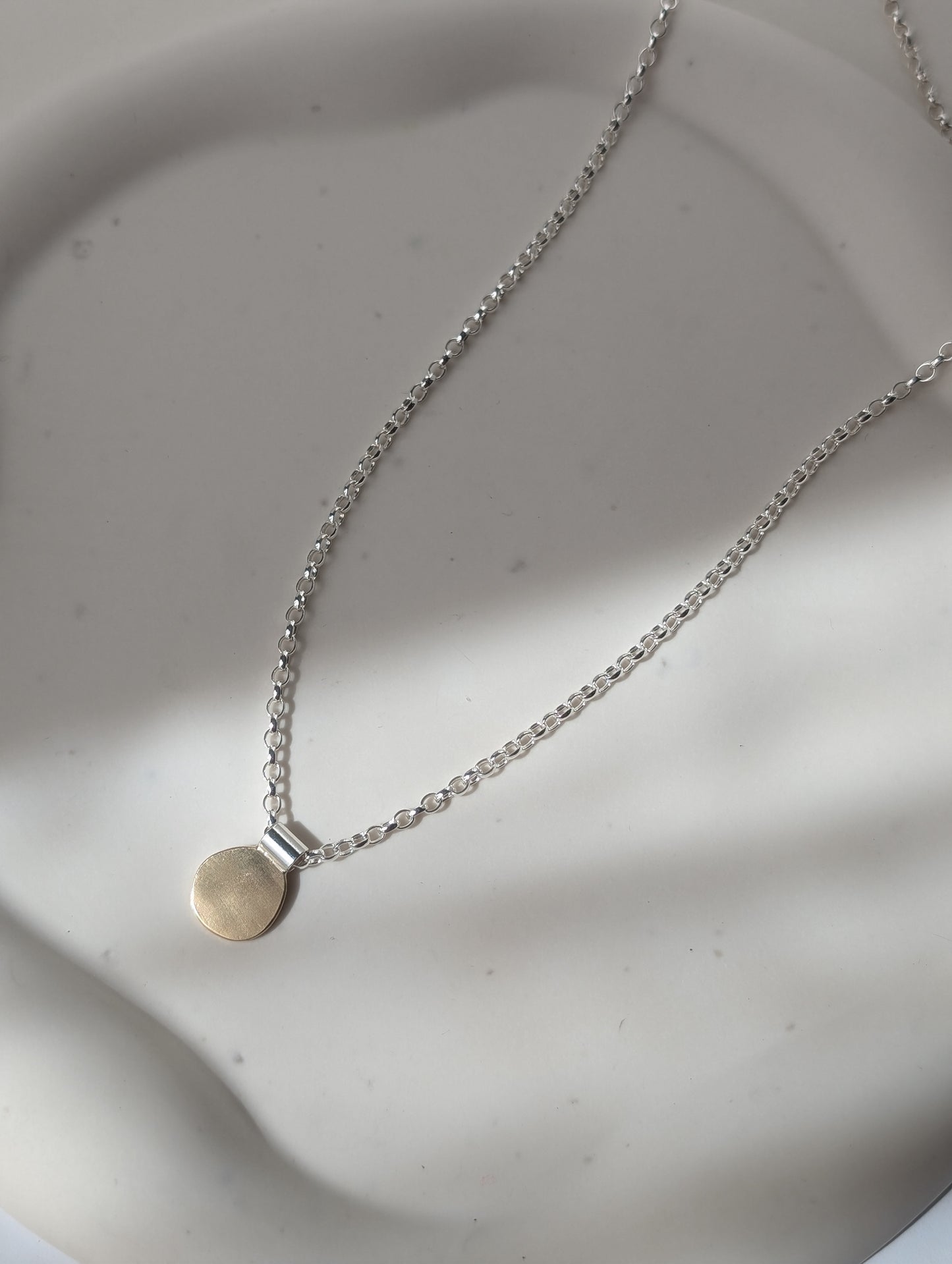 Gold pebble necklace